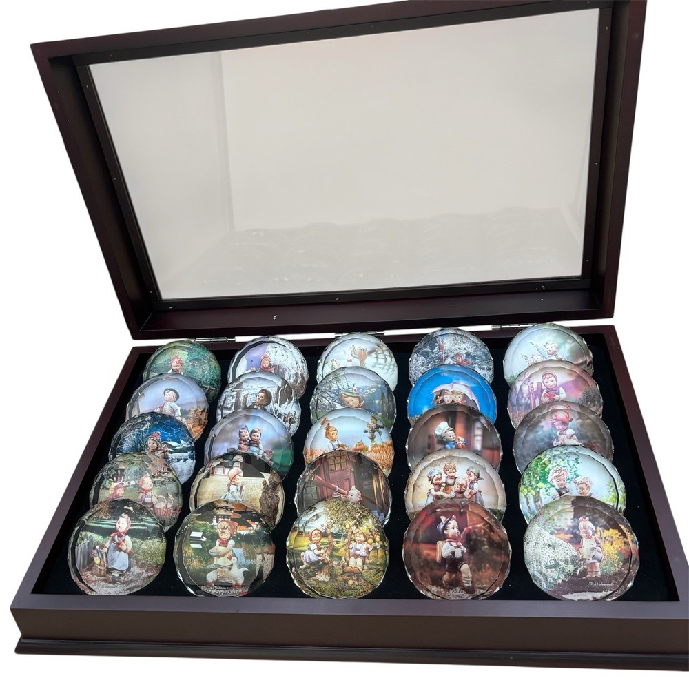 MJ Hummel Art Glass Paperweights in Display Case (25) – Vintage Collector Series